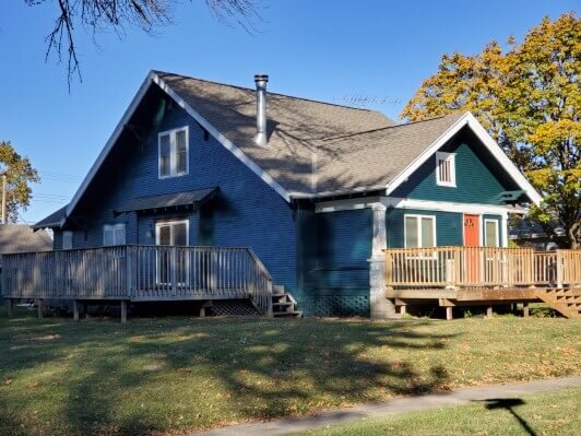 Tekamah, NE home with an exterior paint job in progress.
