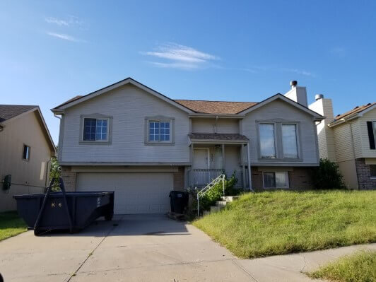 Exterior view of an Anna Buys Houses property before renovation.
