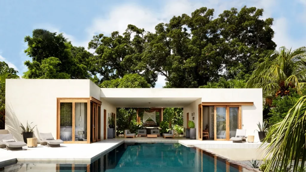 split type home around a pool of water