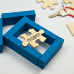 Model house made from wooden block and wooden puzzle with text probate on white background
