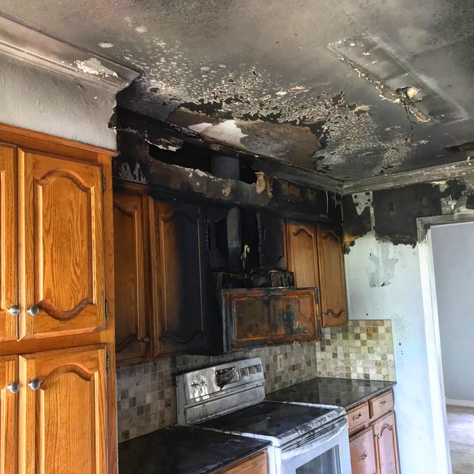 Burned kitchen cabinets and ceiling