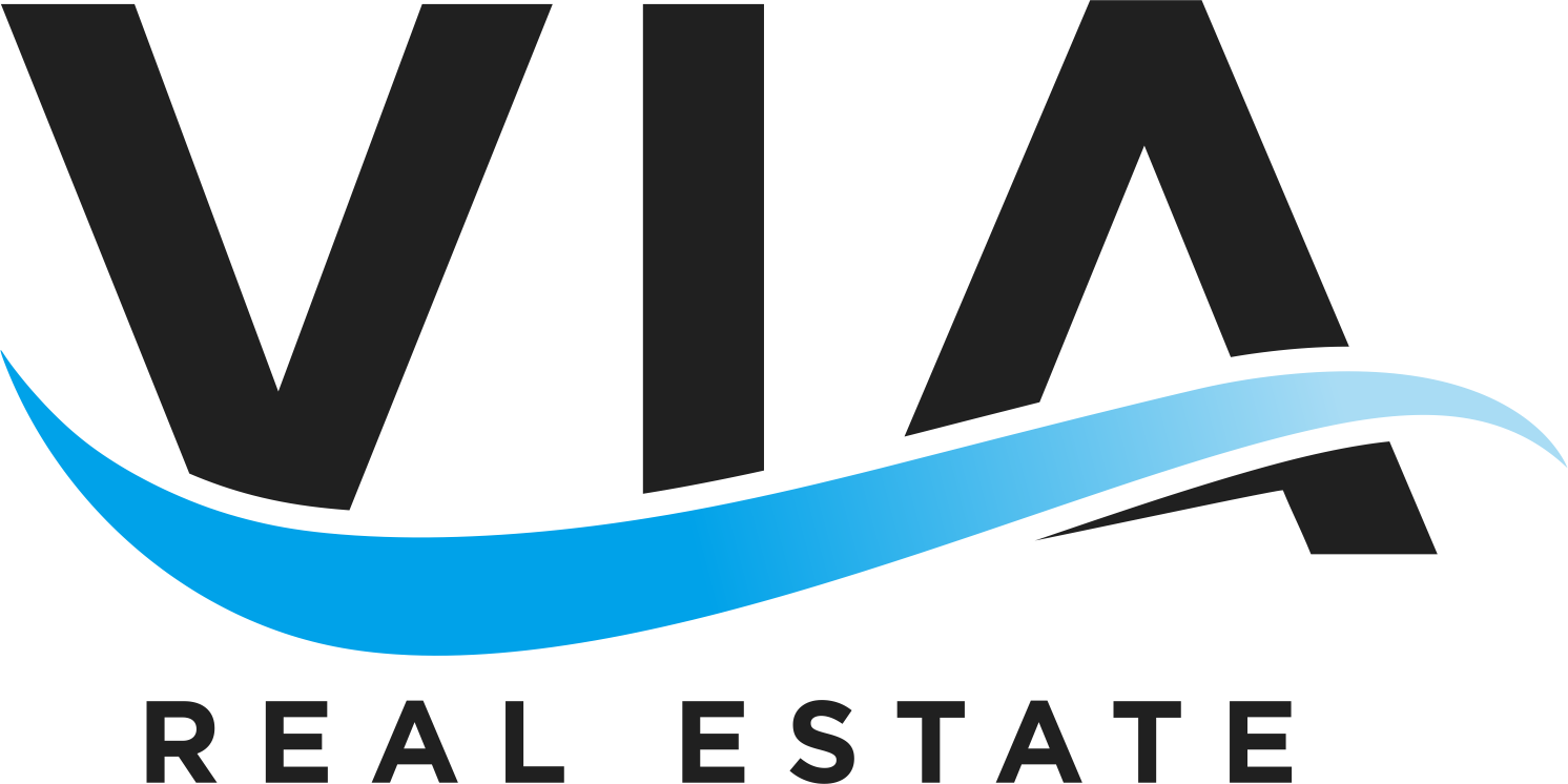 Via Real Estate logo