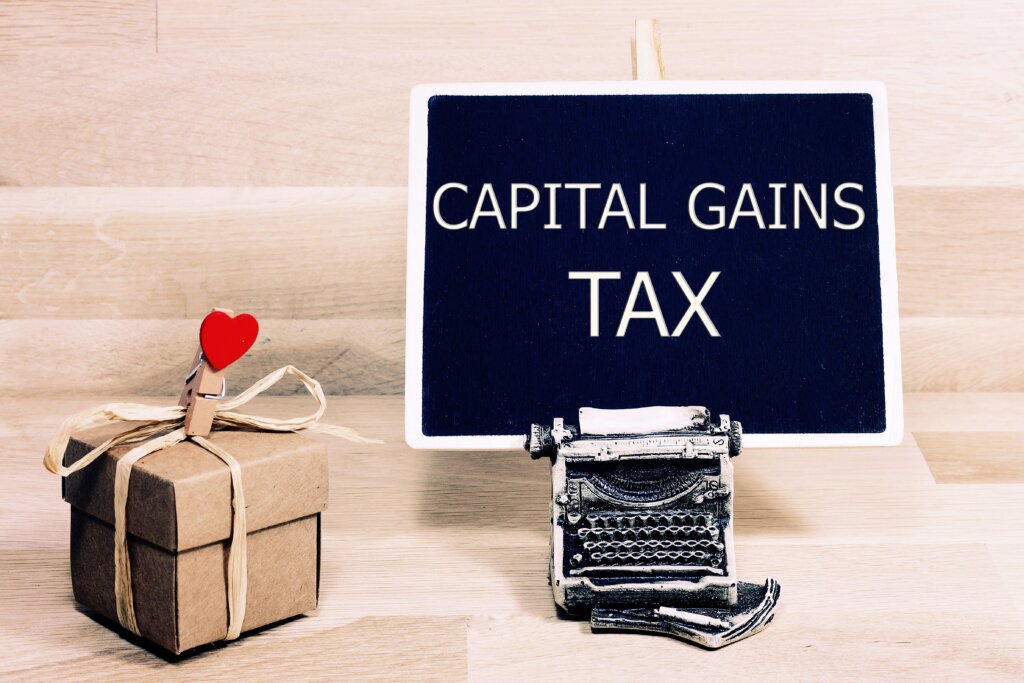 Senior Michigan homeowner reviewing capital gains tax documents before selling a home