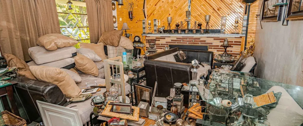 Cluttered house interior prepared for an as-is sale in Southwest Michigan