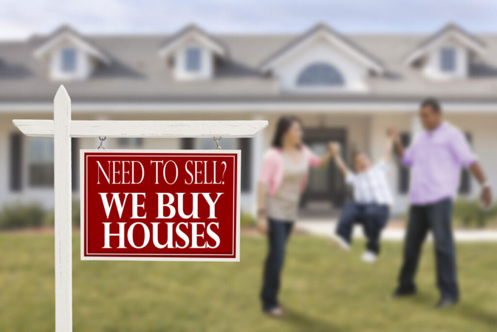 Homeowner reviewing a cash home buyer offer to avoid We Buy Houses scams in Southwest Michigan