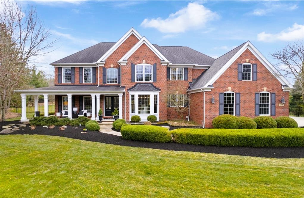 Full brick front 2-story home in The Estates at Ridgemont subdivision in Hinckley, Ohio 44233.