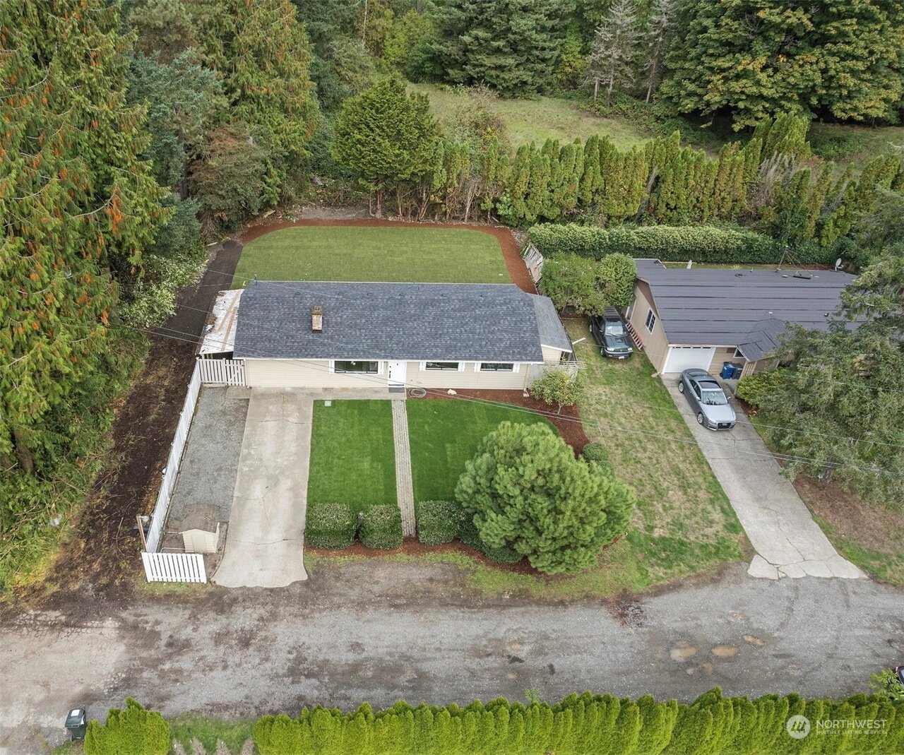 Top View of this Inviting home with an open porch, nestled along Renton Maple Valley Highway.