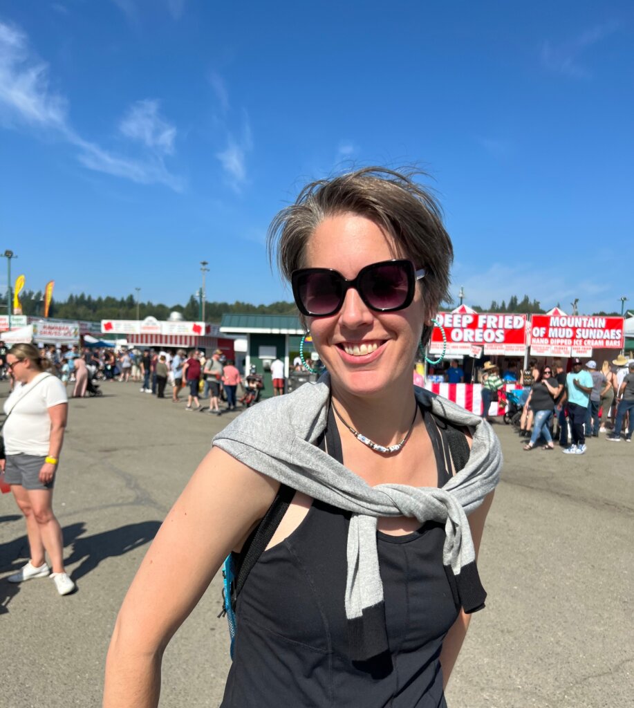 In the heart of the welcoming Kenmore neighborhood, Emily Cressey, enchanted by the community's warm hospitality and vibrant local charm.