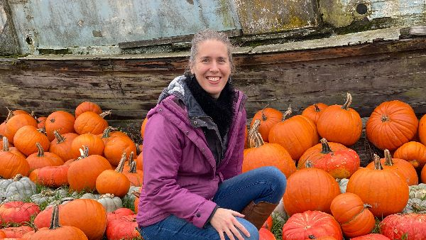 Emily with pumpkins