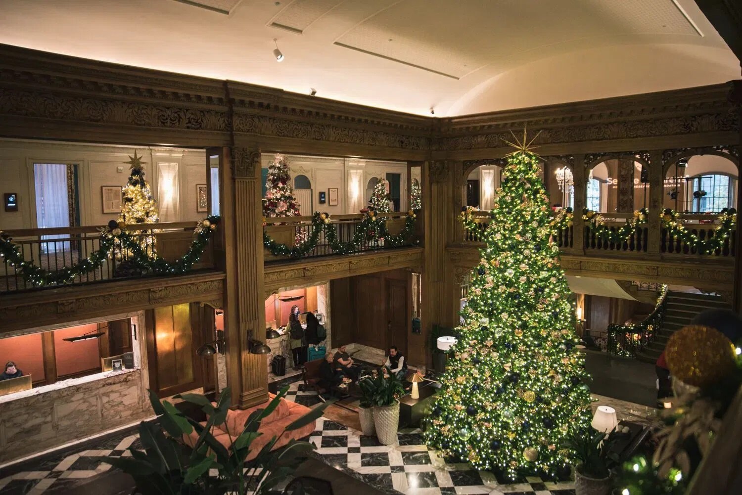 Decorated Christmas trees at the Seattle Festival of Trees inside the Fairmont Olympic Hotel