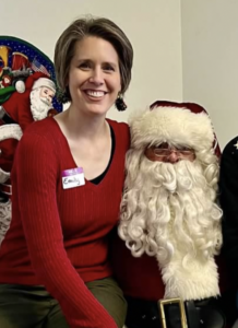 Emily and Santa at Christmas