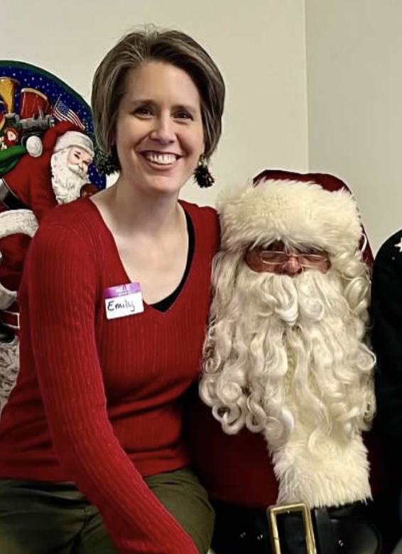 Emily Cressey with Santa at Christmas