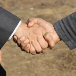 Close-up photograph of business people shaking hands
