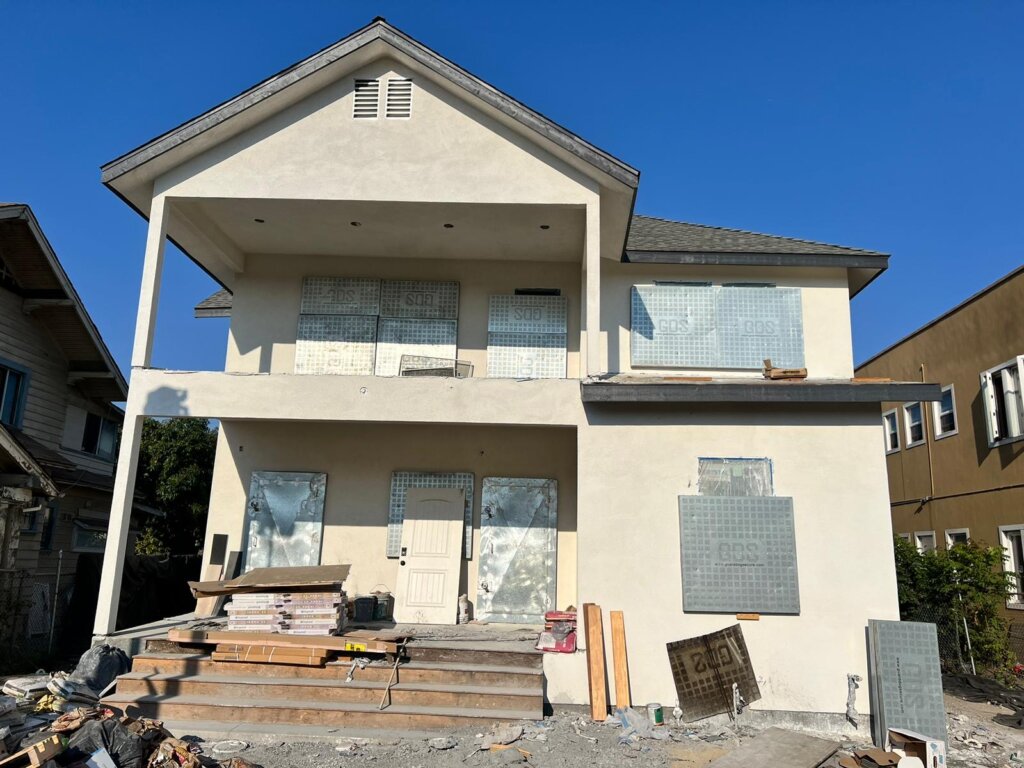 foreclosed house boarded up