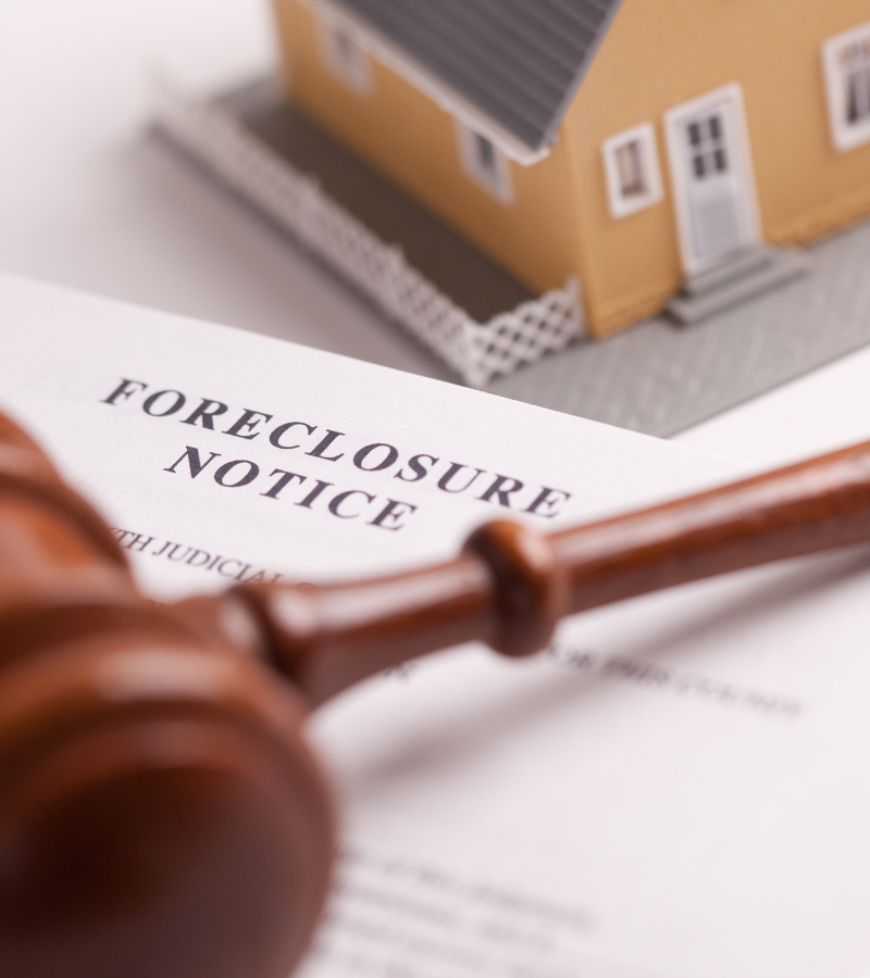 selling a house in foreclosure New York
