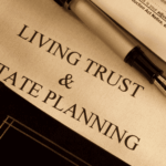 Close-up of a document titled ‘Living Trust & Estate Planning’ with a fountain pen and folder.