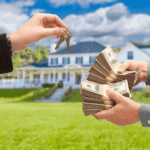 Person exchanging house keys for stacks of cash in front of a home