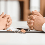 Couple Dividing Marital Property in Office of Divorce Lawyer