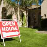 Open house sign in front of a residential home.