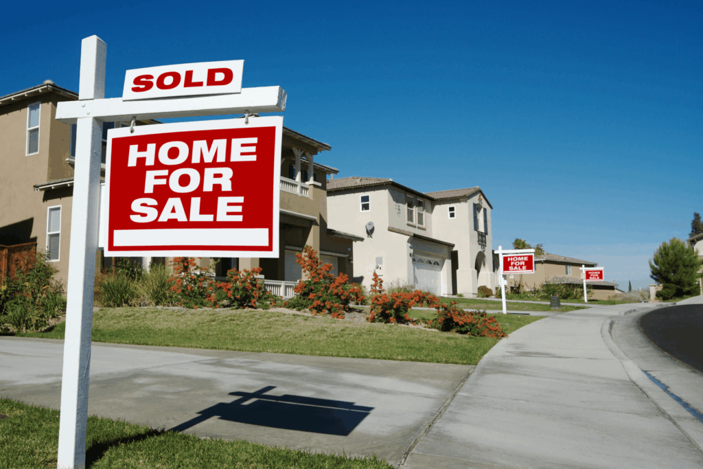 Arkansas homes for sale with sold real estate sign in neighborhood