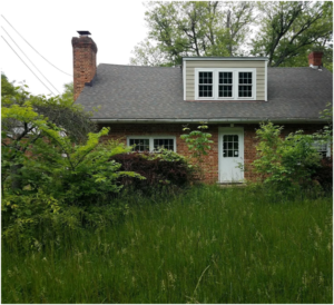 House with overgrown lawn Columbus, Ohio