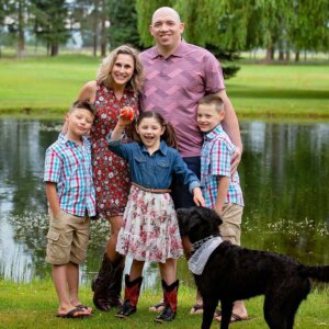 ryan garrison family pic in montana with dog