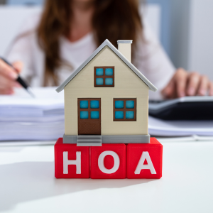 Who addresses HOA fee payments at closing In Washington