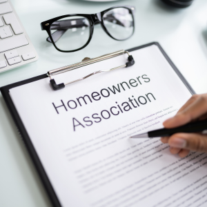 Who is in charge of paying HOA fees at closing In Washington
