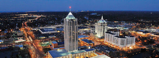 Areal view of the night skyline in downtown Virginia Beach, Hampton Roads VA.