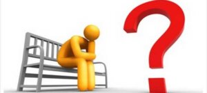 Drawing of a human being in yellow color sitting on a gray bench deep in thought and questions over divorce problems.