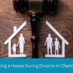 Couple dividing a Charlotte, NC marital home during divorce, reviewing sale options