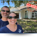 Anne & Mike Laurenzi in front of a house they purchased in Perdido Key.