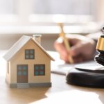 How to Sell Your House to Avoid Foreclosure header image; model house with judge's gavel