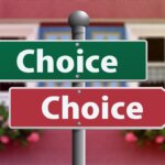 Street sign with opposing green and red arrows labeled "choice"