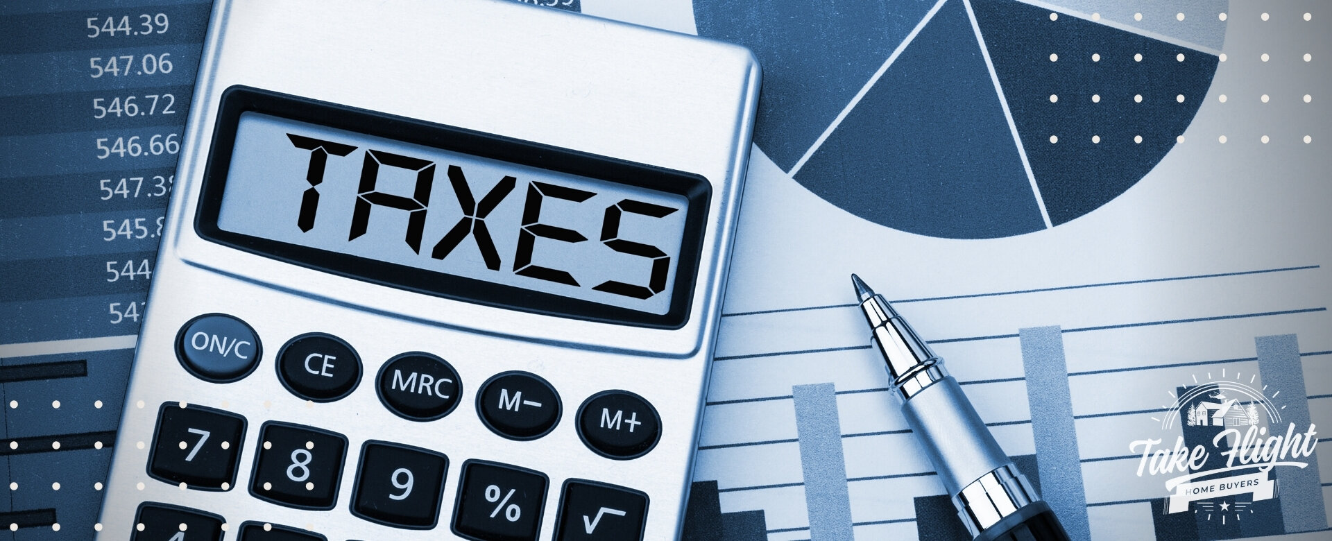 Calculator that says "taxes" on the screen with graphs, tables, and a pen in the background.