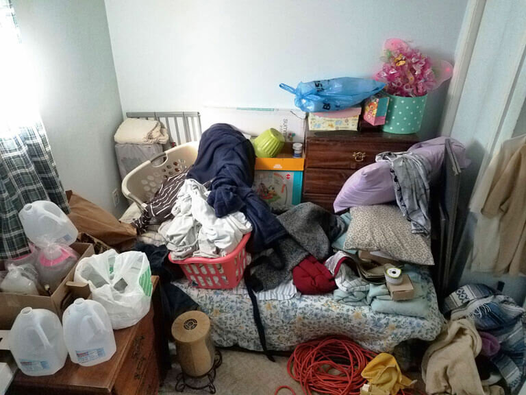 Messy room being cleaned out by Ryan David
