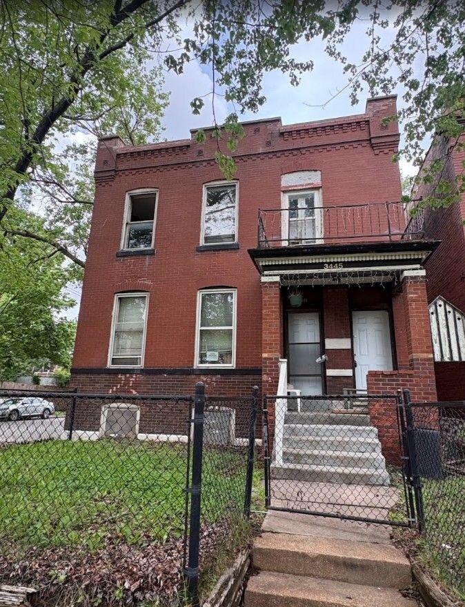 Inherited brick rowhouse in St. Louis bought as is for cash