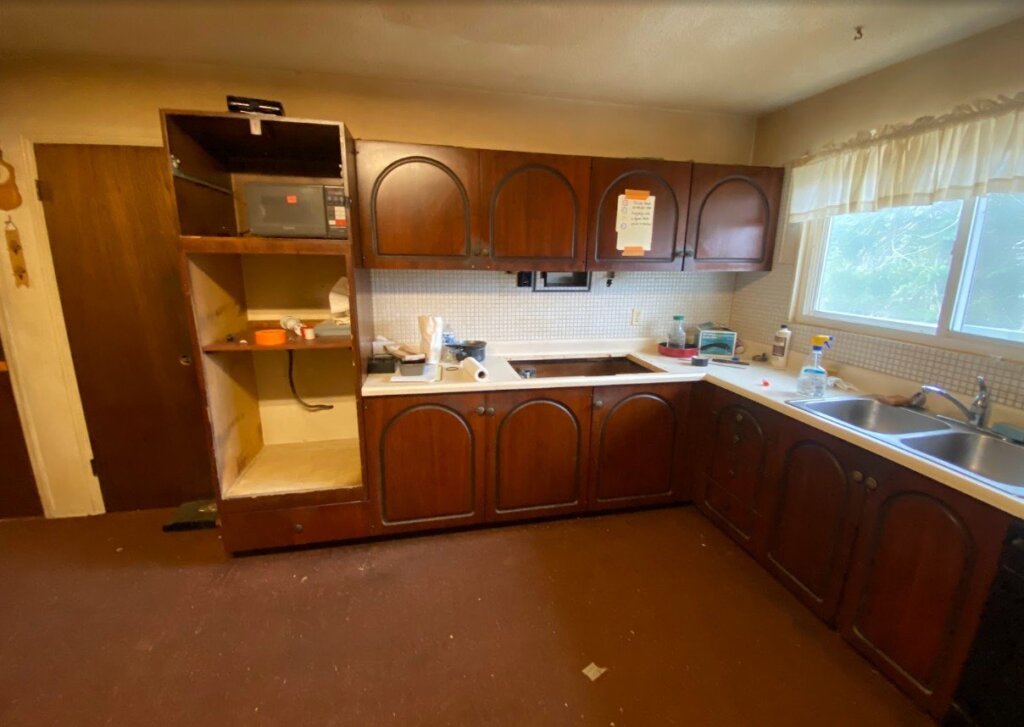 Dated kitchen in a probate house before renovation