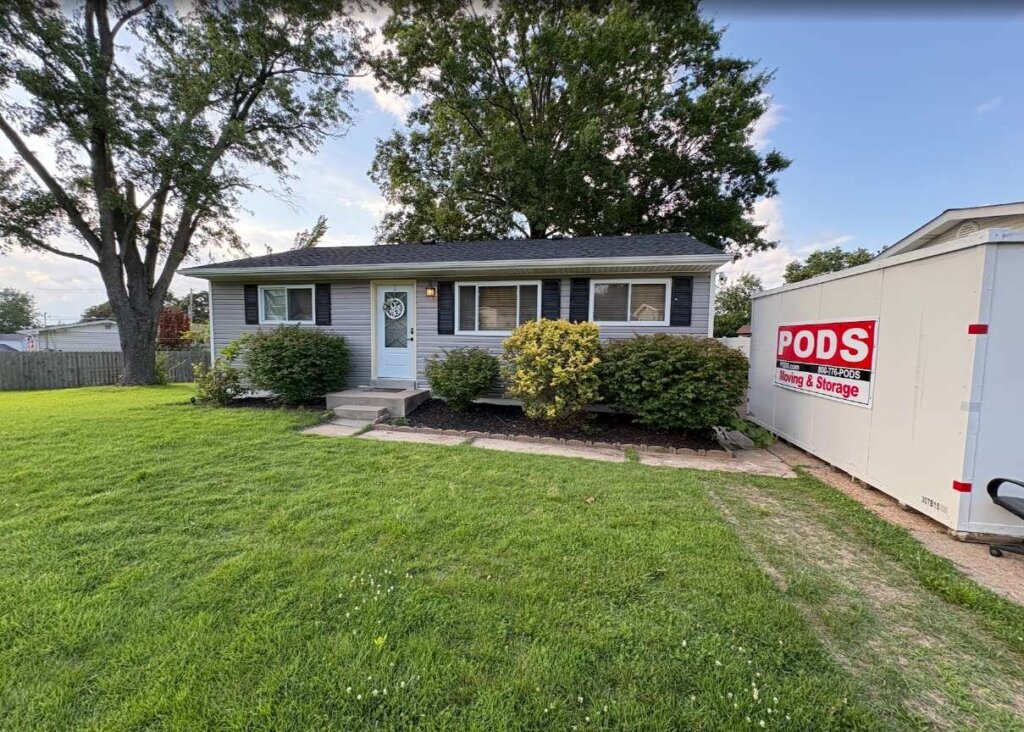 St. Louis ranch home sold to Bird River Properties for cash, moving container in the driveway