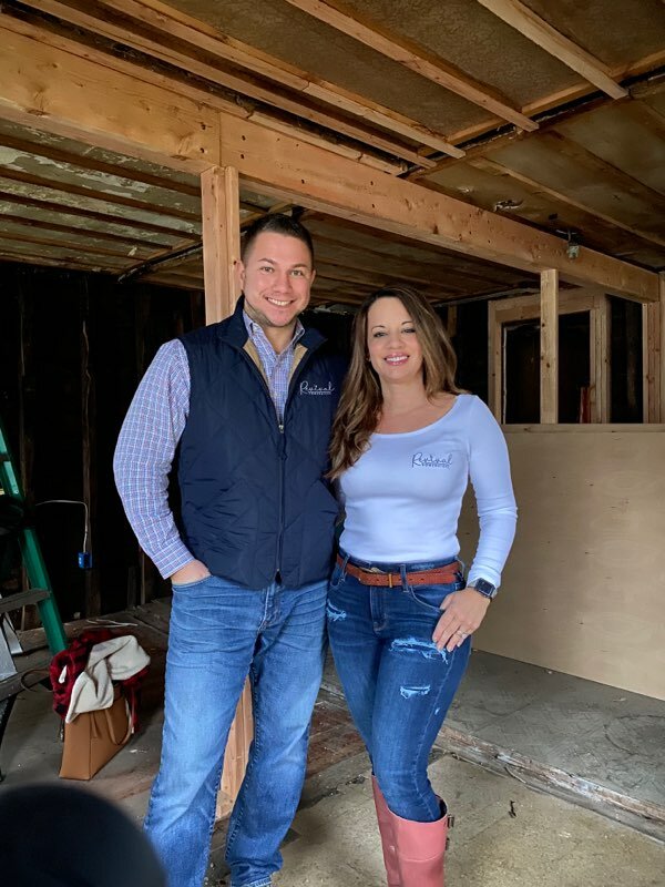 This is a photo of Matt and Kelli the owners of Revival Homeowners in a home they are rehabbing in Springfield MA