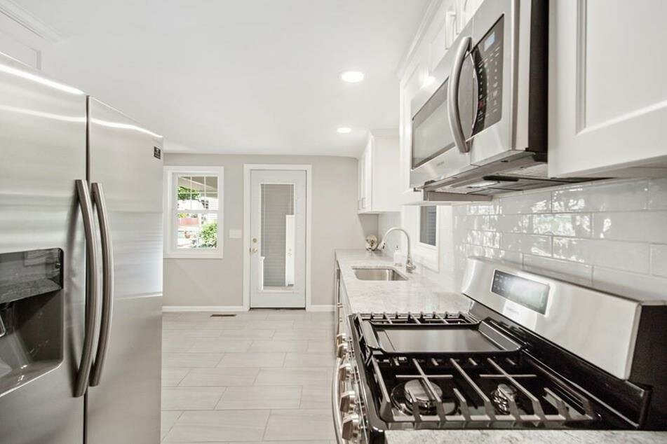 This is an after photo of a kitchen in a home that Revival Homebuyers purchased for cash in Chicopee MA