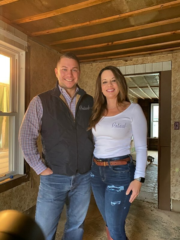 This is a photo of Matt and Kelli the owners of Revival Homeowners in a home they are rehabbing in Springfield MA