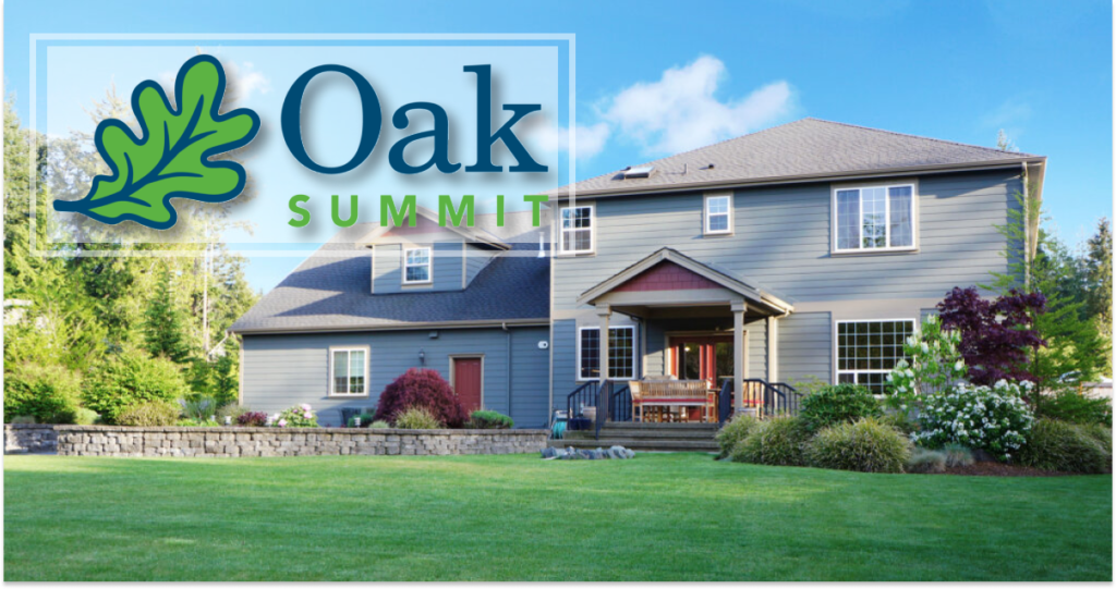 The Oak Summit Group logo overlaid on a beautiful two-story house with a well-maintained lawn and garden, perfect for those looking to sell my house fast.