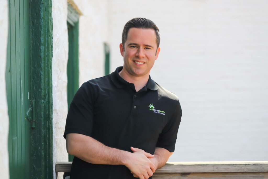 Jon-owner-we-buy-houses-nj-halo-homebuyers-on-railing