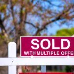 Sold Sign Showing Multiple Offers in Hot Real Estate Market