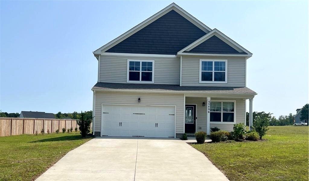 Two-story home with a two-car garage and front porch in Southampton County