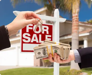 Home seller receiving cash after selling a house