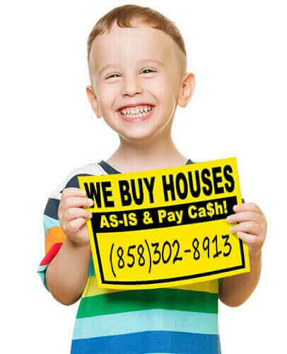 A caucasian boy holding a yellow sign that reads WE BUY HOUSES AS-IS & Pay Cash! (858)302-8913