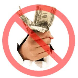 a cancel sign over a hand holding cash