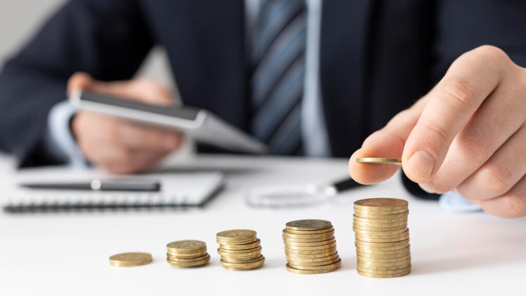a person holding coins